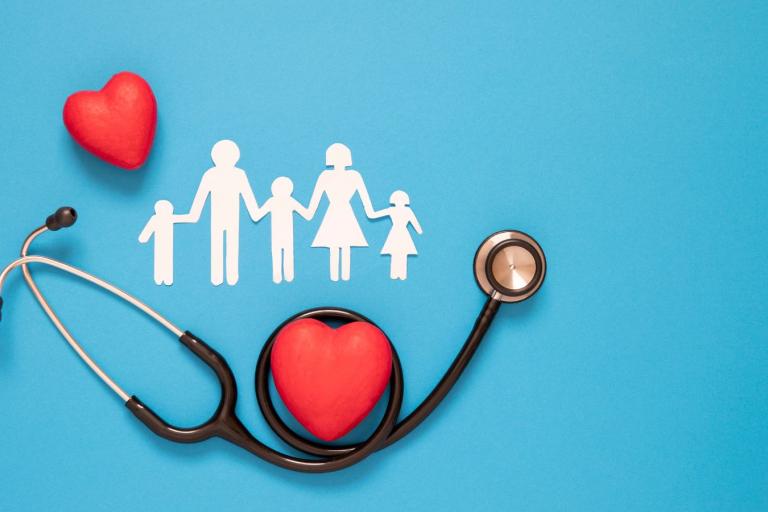 A stethoscope wrapped around a heart